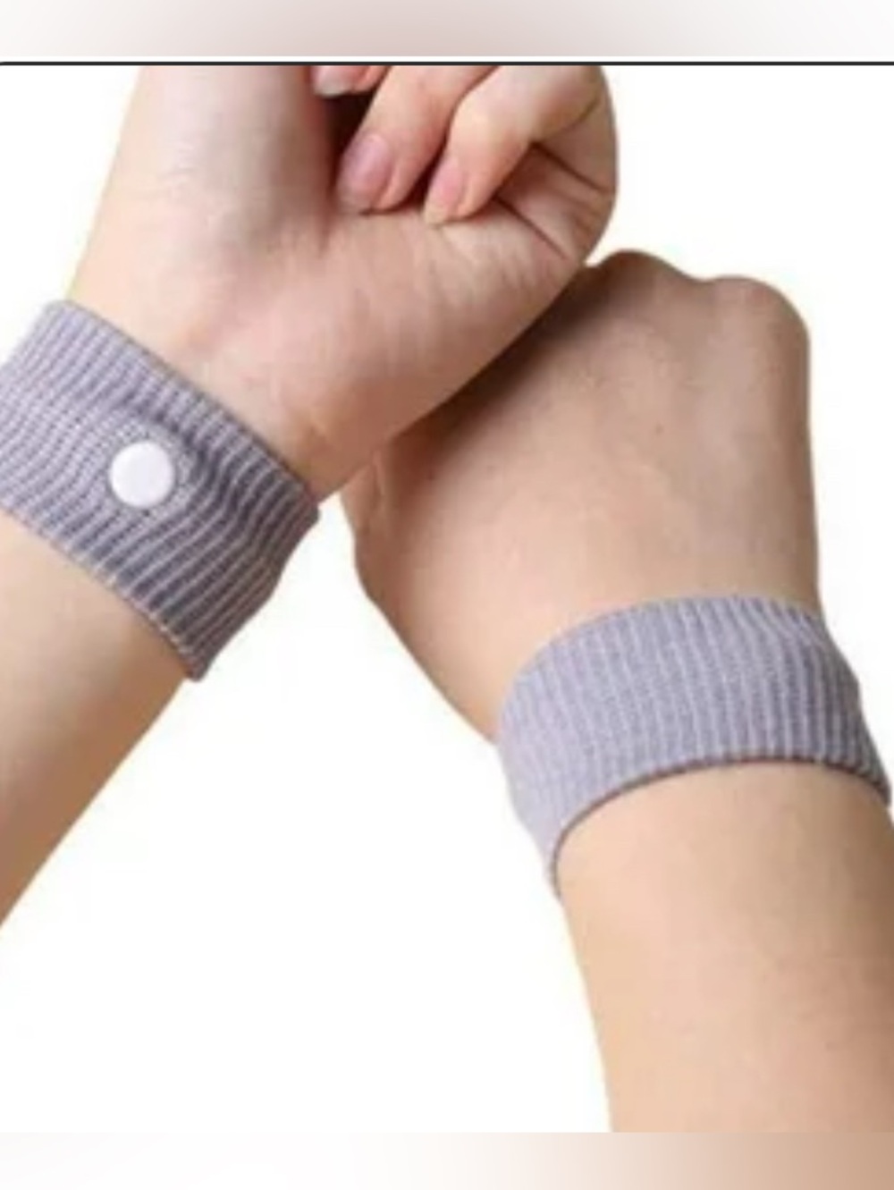 Gray Elastic Wristbands with anti nausea button.